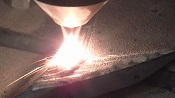 Ground engagement tooth laser harfacing